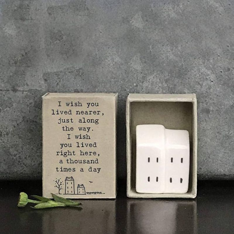 white porcelain matchbox house with the saying I wish you lived nearer