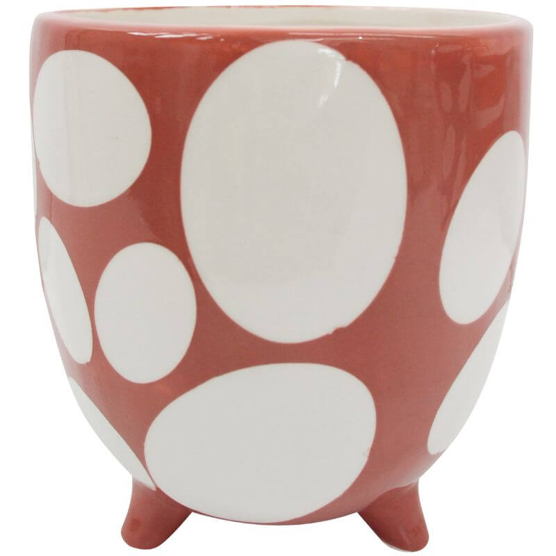 planter in a cinnamon colour with various sized polka dots in white
