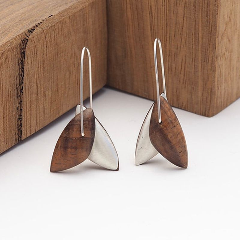 Small blossom earrings made with sterling silver and australian red mallee wood sarah burke