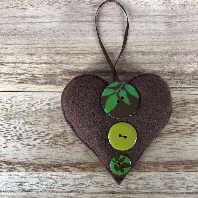 brown felt heart ornament with lime green buttons and leafy buttons
