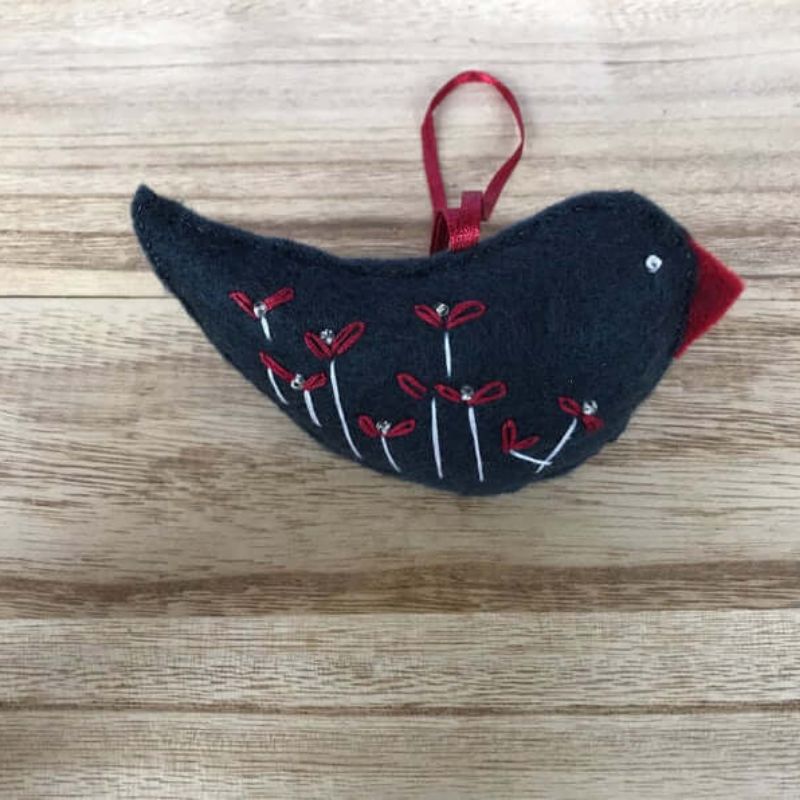 navy blue felt bird with embroidered flowers ornament