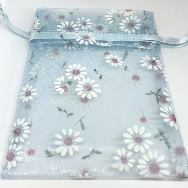 blue organza bag with daisy pattern