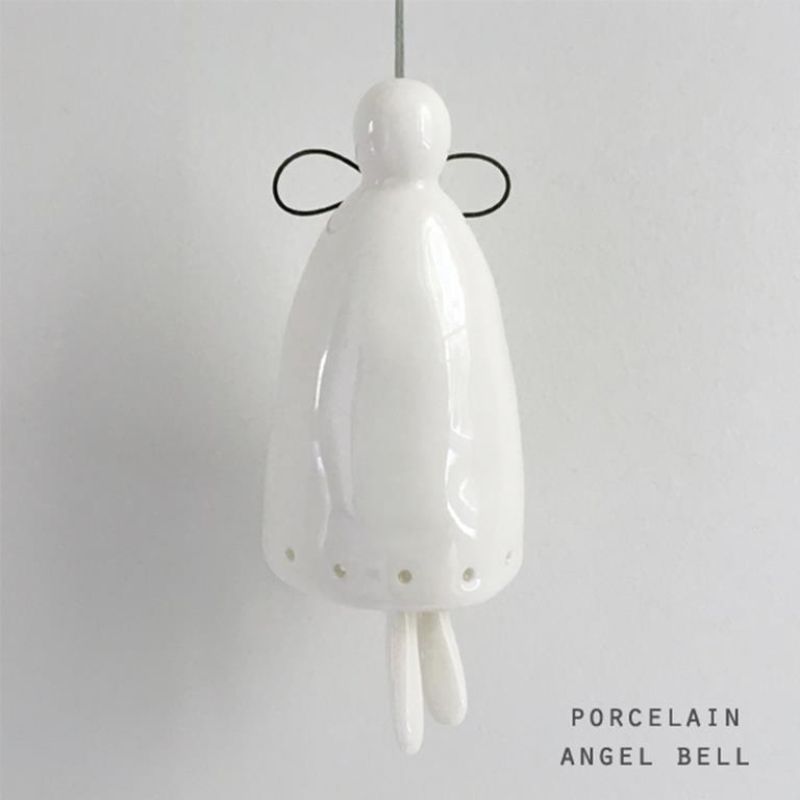 white porcelain angel bell large with legs that clang against the body and wire wings