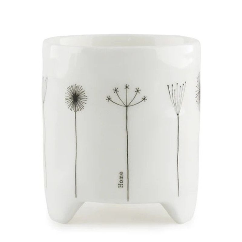 white porcelain east of india planter with dandelions and home on the side