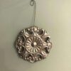 silver flower shaped ornament decoration
