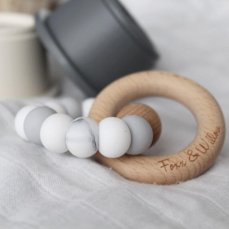 infinity teething rattle wood with silicone beads grey tones