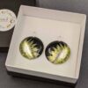 earrings photo of king protea transferred onto aluminium boxed