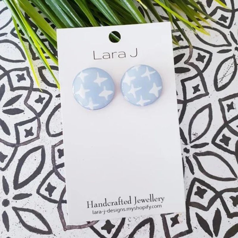 20mm studs light blue with white crosses
