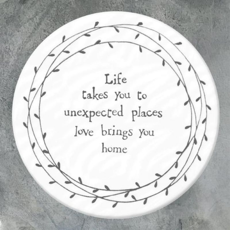 White porcelain round coaster, life takes you to unexpected places, love brings you home