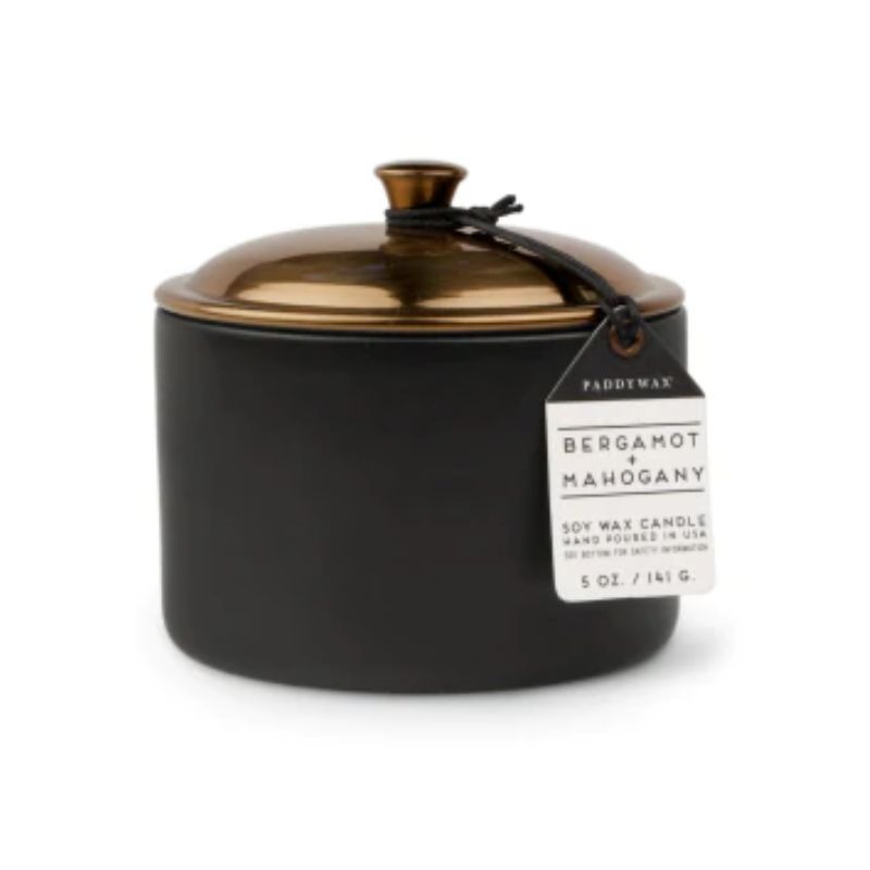 paddywax hygge candle bergamot and mahogany in black ceramic container with faux copper lid