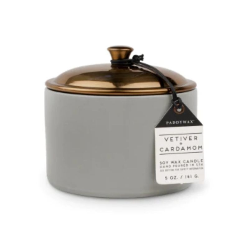 Paddywax Hygge candle in vetiver and cardamon in pale grey container with faux copper lid