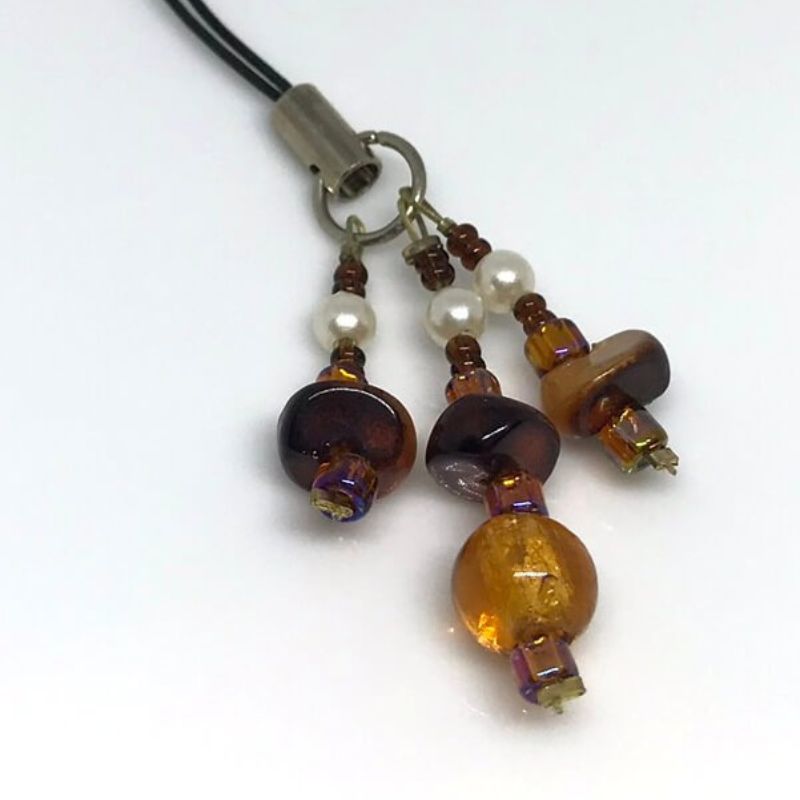 phone or bag charm brown beads, tortoise shell and ivory beads