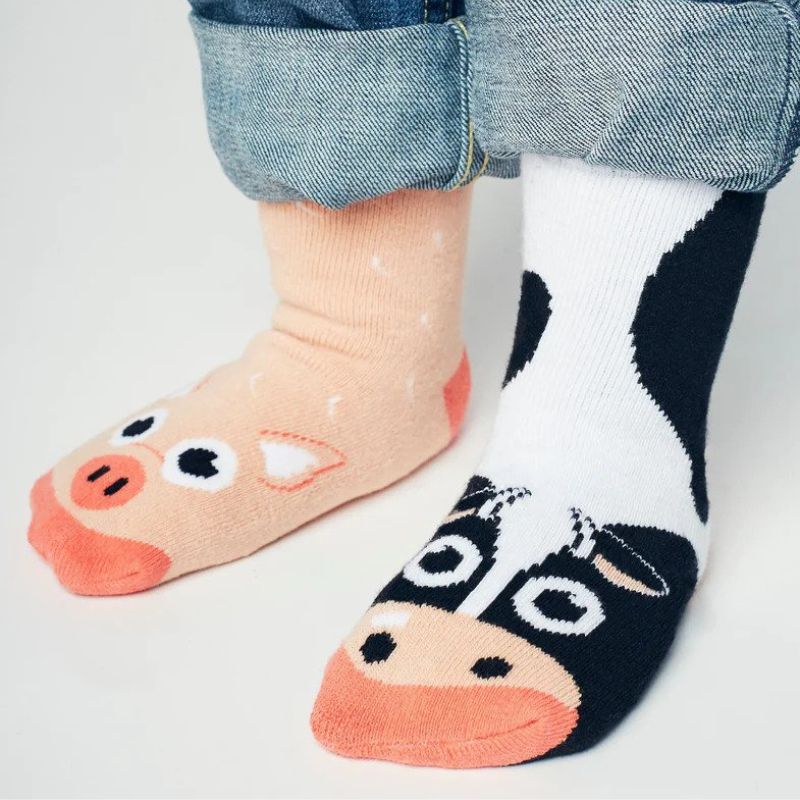 pals mismatched socks cow and pig