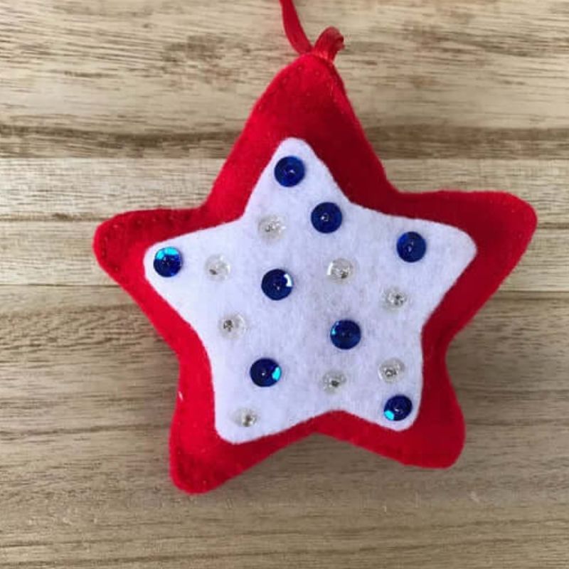 red and white felt star with blue and clear sequins decoration oranment
