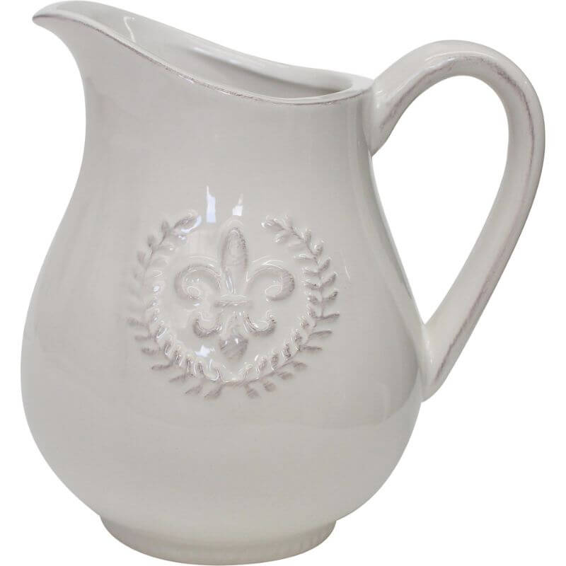 white porcelain jug with fleur de lys pattern