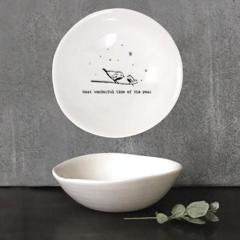 porcelain trinket bowl with a bird illustration and most wonderful time of the year text