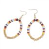 Multi coloured hoop earrings with gold bead accents as the bottom of the hoops